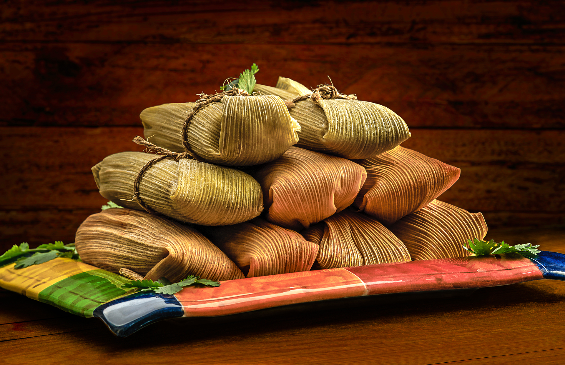 Mexican tamales made of corn chicken pork and chili